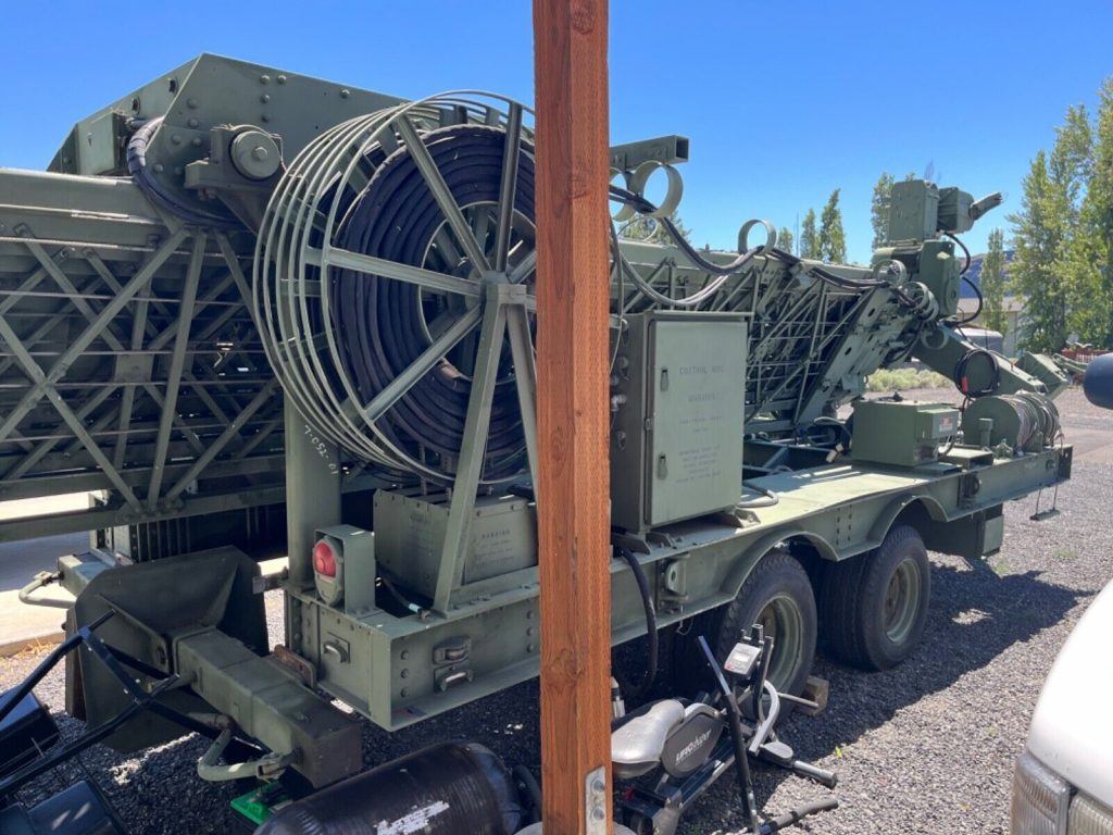 Mobile communications tower/ C. O. W. 118’ TRIEX