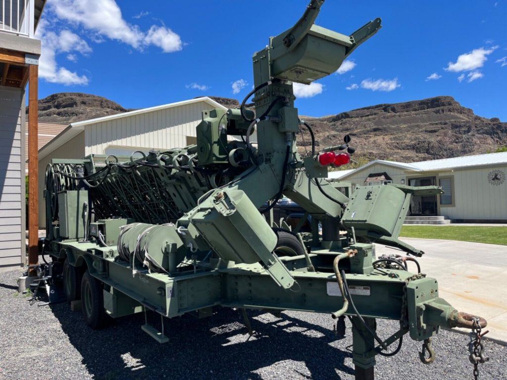 Mobile communications tower/ C. O. W. 118’ TRIEX